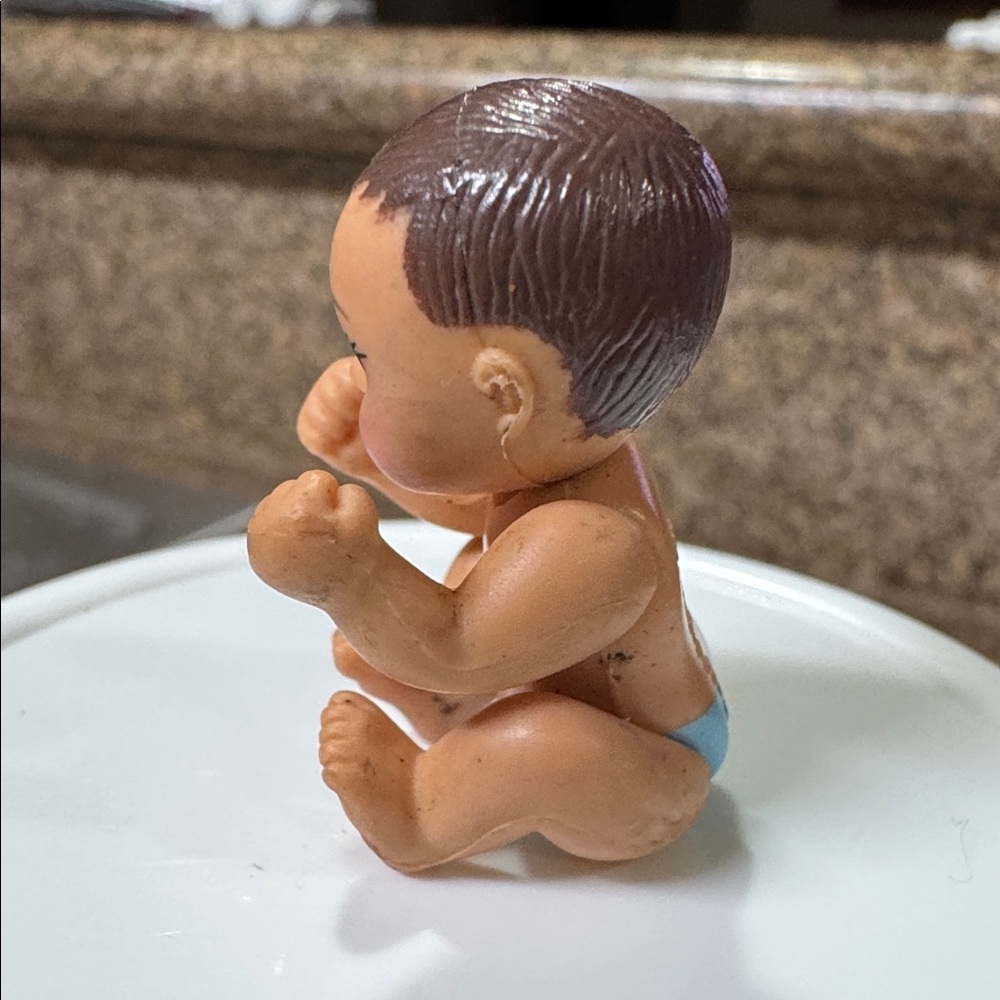 The product is a baby doll from the "Happy Family" line was a part of the Barbie - Picture 2 of 5